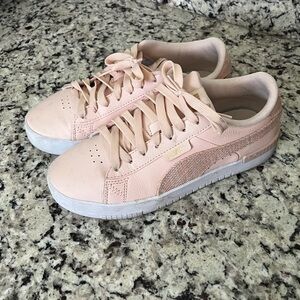 Puma tennis shoes.